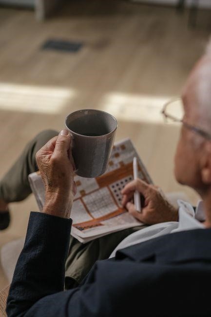 manual readers crossword clue